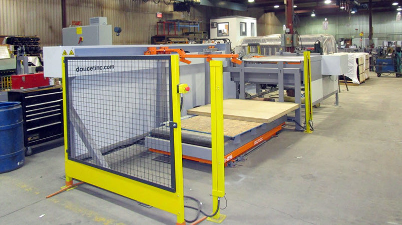 Loading side of the Used Doucet Automatic Panel Grooving and Ripping Line